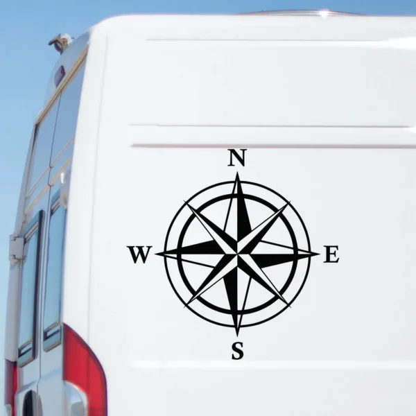 Black compass vinyl decal sticker applied to camper van side panel
